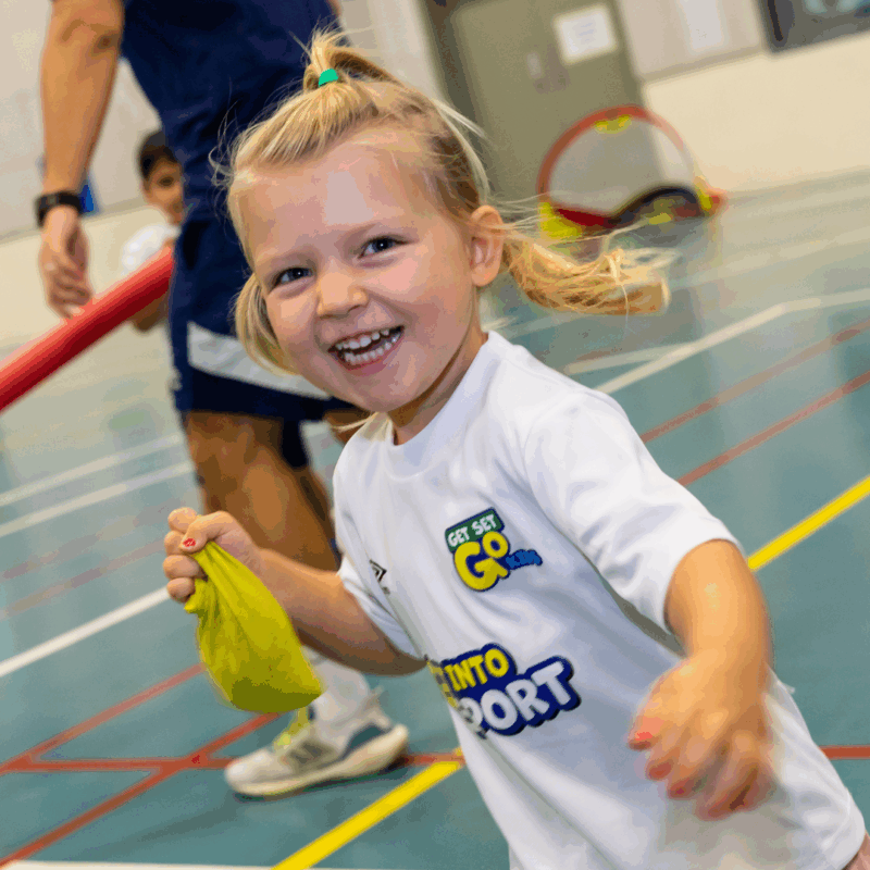 Toddler Movement Classes in Dubai - girl holding a beanbag